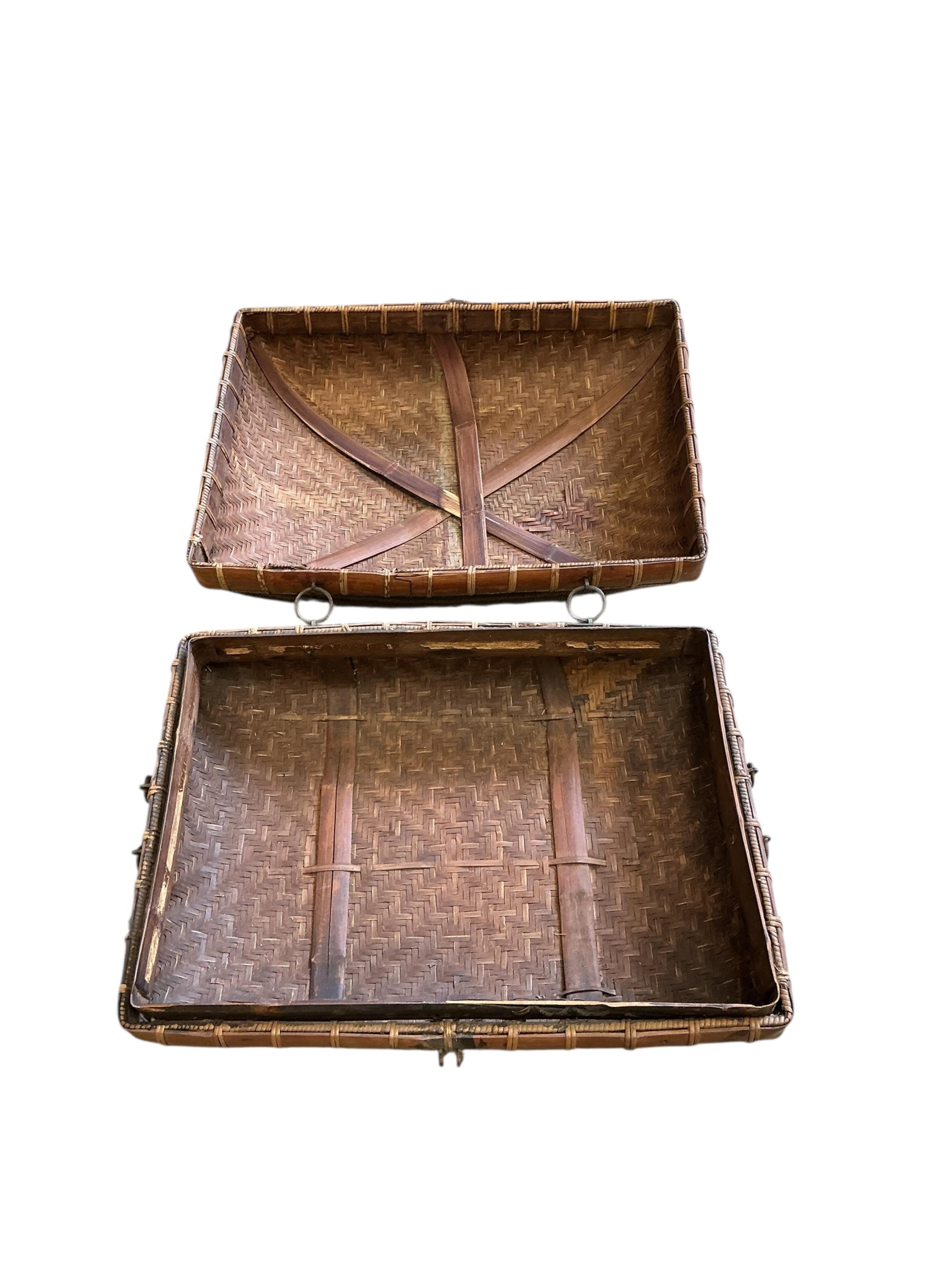 A Chinese rectangular bamboo and rattan box, width 56cm, depth 40cm, height 26cm together with a Chinese circular sectional box